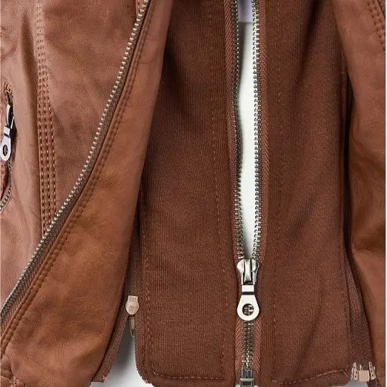 Brown faux leather moto jacket with silver zippers and stitched detailing featuring a detachable hood.