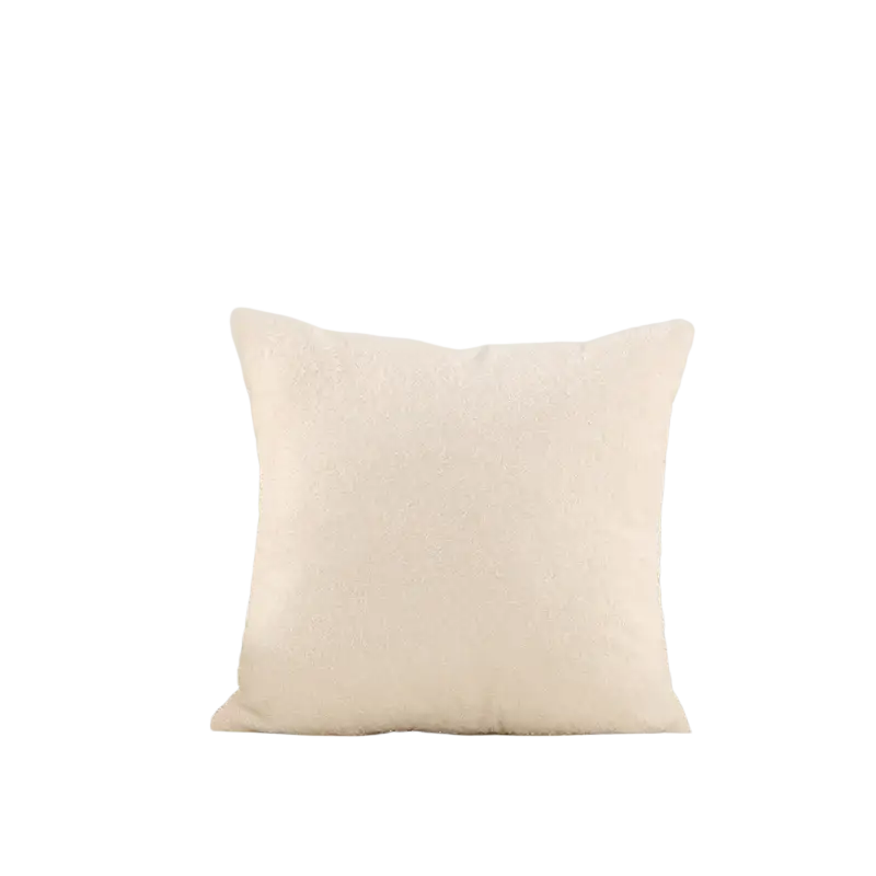 Cream-colored 60x60cm cushion cover with plush, soft textured surface made of teddy velvet fabric