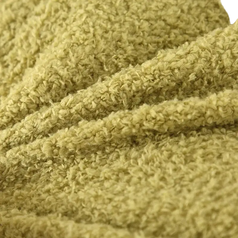 Soft olive-green 60x60cm cushion cover made of plush teddy velvet with a solid 60x60cm pure color design