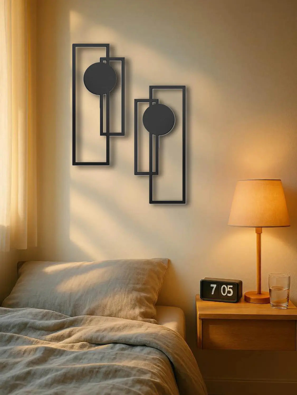 Black metal wall art 2 piece set featuring abstract geometric design with rectangular frames and circular elements in black metal.