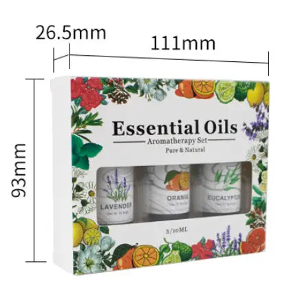white cardboard box containing three small glass bottles of essential oils labeled lavender orange and eucalyptus in an essential oil set lavender tea tree peppermint 3 pack