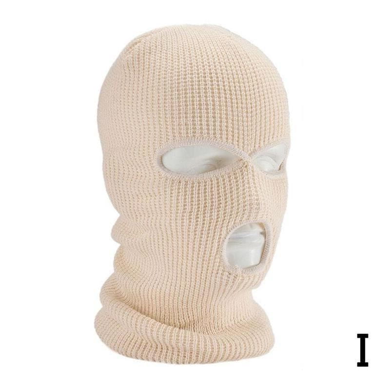 Bonnet cagoule tricoté beige, avec des ouvertures pour les yeux et la bouche, conçu comme un masque chaud pour le cyclisme.