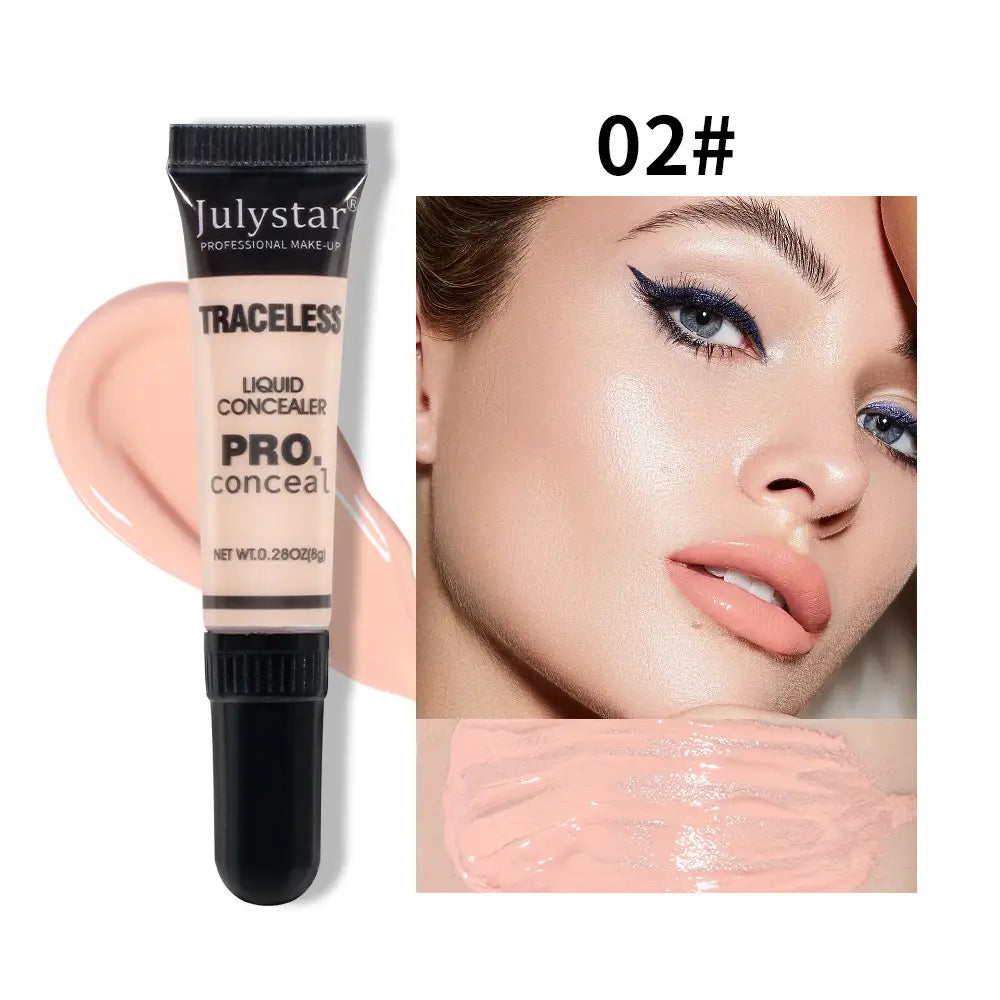 Julystar traceless pro tattoo concealer in shade 02 in a sleek black-topped tube containing beige liquid makeup for natural coverage.
