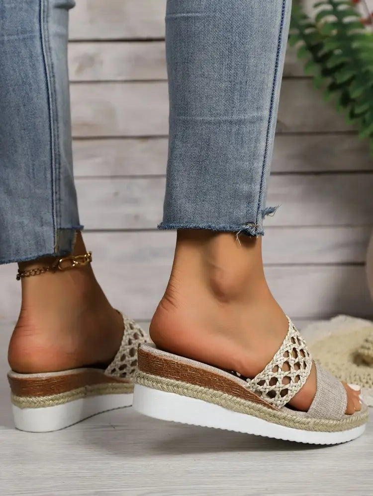 Beige woven women’s mesh espadrille platform wedge sandals with braided jute detailing and white rubber sole.