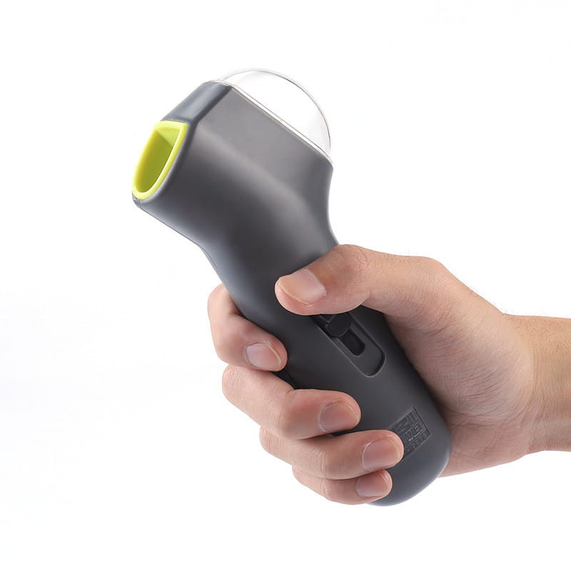 Lanceur de friandises pour chien télécommandé ergonomique gris et vert citron vert, jouet pour animal de compagnie, avec dôme supérieur transparent conçu pour distribuer des graines.