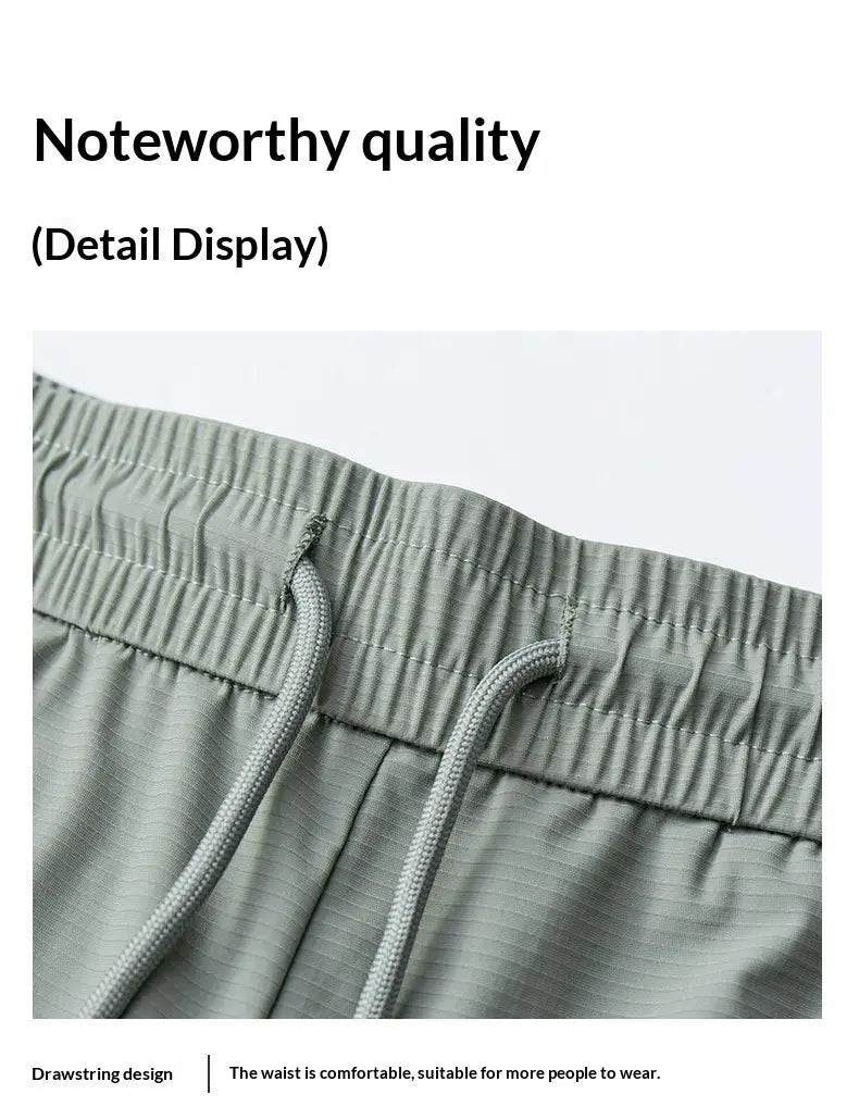 gray ice silk antibacterial casual sweatpants featuring a ribbed fabric drawstring waistband with a matching cord.
