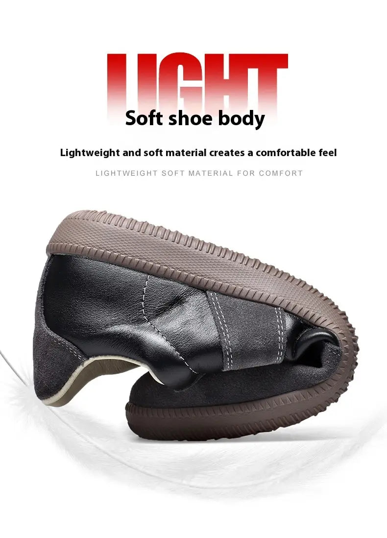 Schwarzer Lederschuh zum Hineinschlüpfen für Herren aus Deutschland mit brauner Gummisohle und vernähten Details, gestaltet für den lässigen Einsatz.