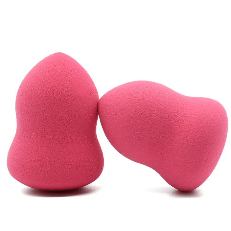 Two vibrant pink teardrop hydrophilic foam makeup sponges with a soft porous texture in a 2 pack.