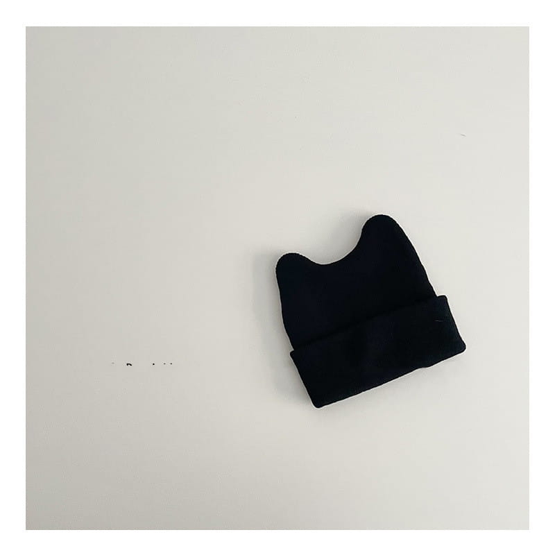 black knitted beanie hat for children with a soft folded brim and rounded ear-like shape designed as a warm winter cap