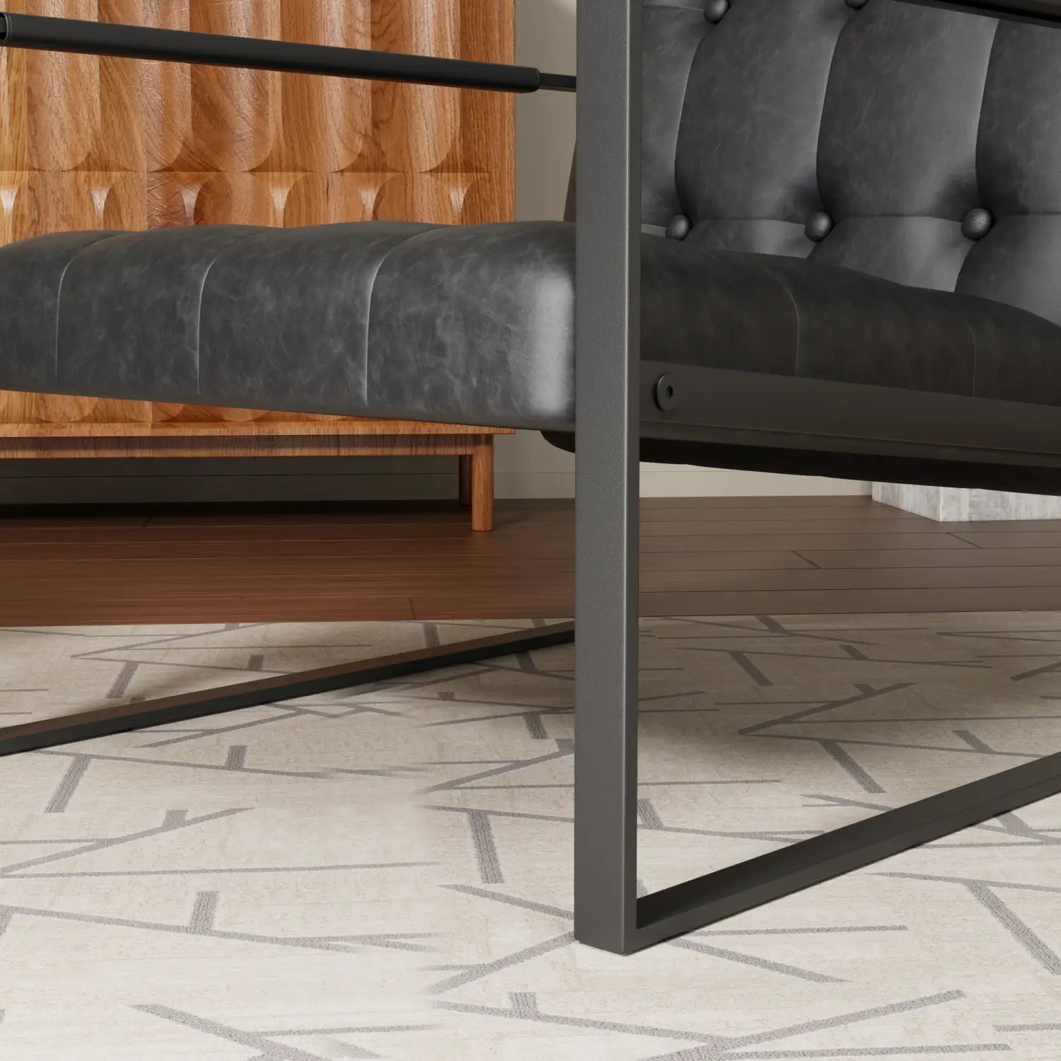 Sillón de acento de cuero negro con capitoné, con un marco metálico elegante que muestra su tapicería de cuero negro con capitoné y su estructura metálica moderna para un asiento con estilo.