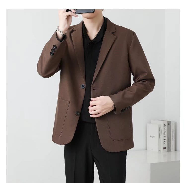 Men slim fit brown blazer featuring black buttons and subtle stitching details for a polished formal look.