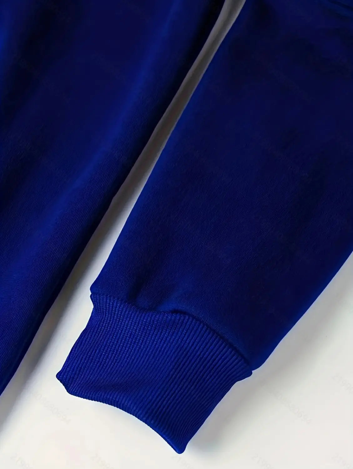men’s sport casual fleece lined zipper hoodie jacket showing royal blue cotton sweatshirt sleeve with ribbed cuffs.