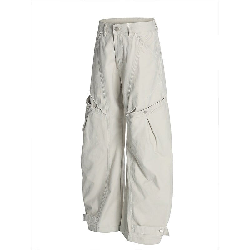 Beige wide-leg cargo pants featuring multiple pockets designed for versatile use.
