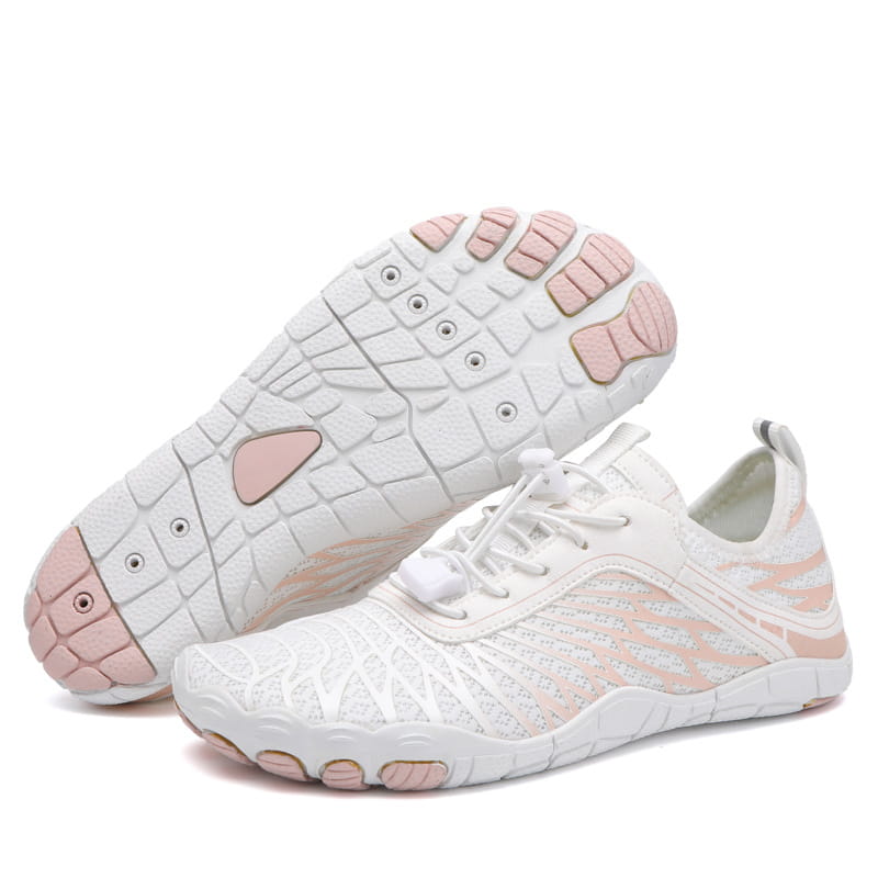 Breathable non slip quick dry water sports shoes in white and blush pink with a mesh upper and segmented rubber sole