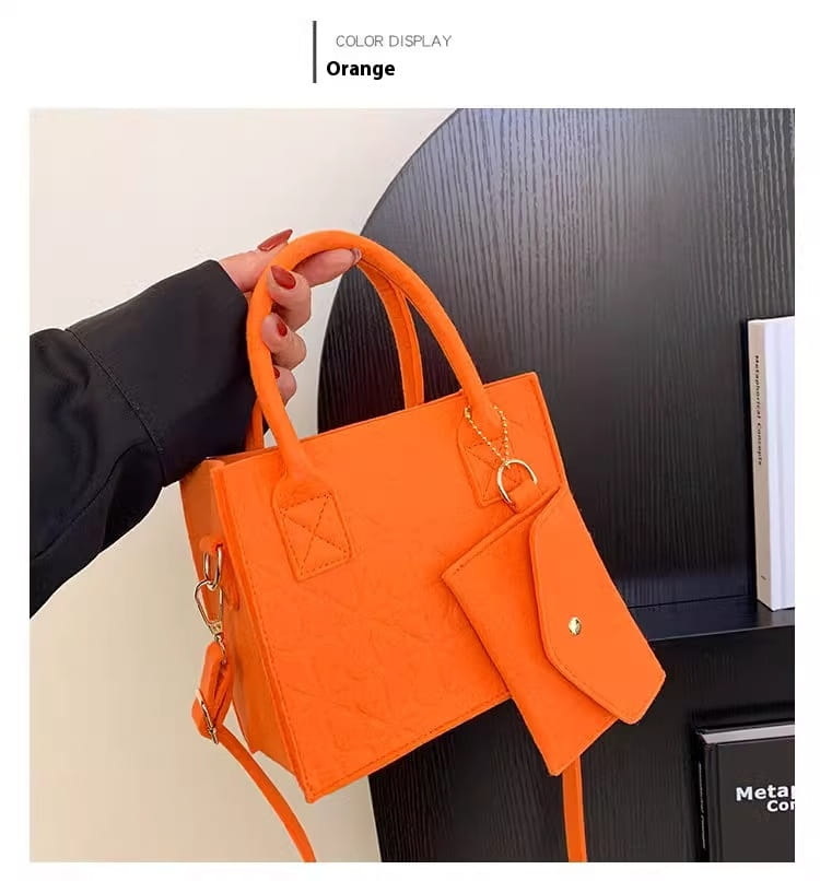 Lebhaftes oranges Minihandtaschen-Set aus Kunstleder mit passendem, abnehmbarem Schulterriemen und abgestimmter Münzbörse.