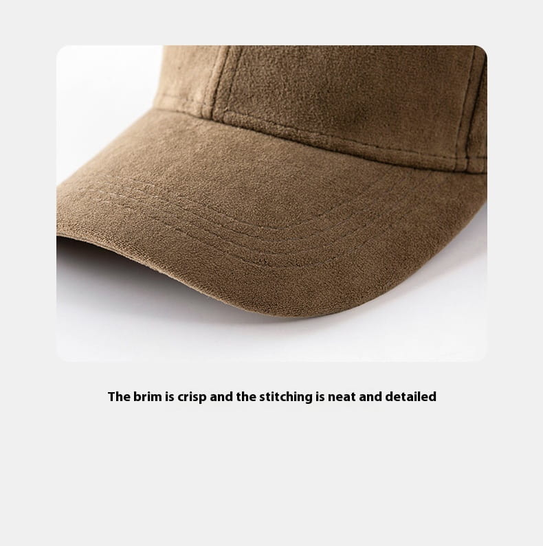 A brown suede baseball cap with a soft minimalist design and a crisp stitched brim.