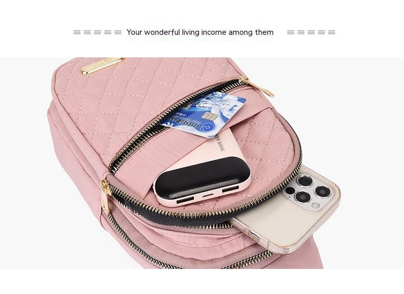 Pink quilted crossbody slanted chest bag for women with gold-tone zippers and a small metallic plaque on the top flap.