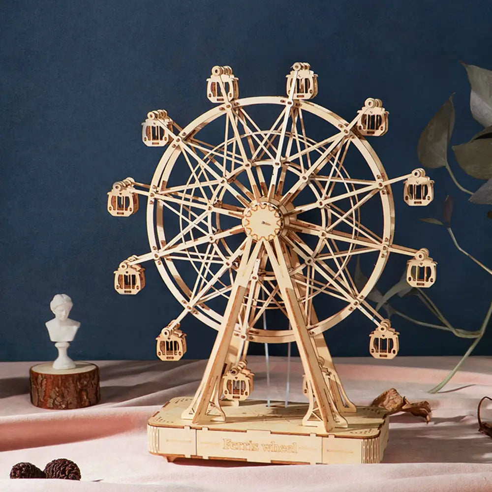 A light wood-finish 3d wooden puzzle ferris wheel model with intricate laser-cut pieces and small passenger cabins.