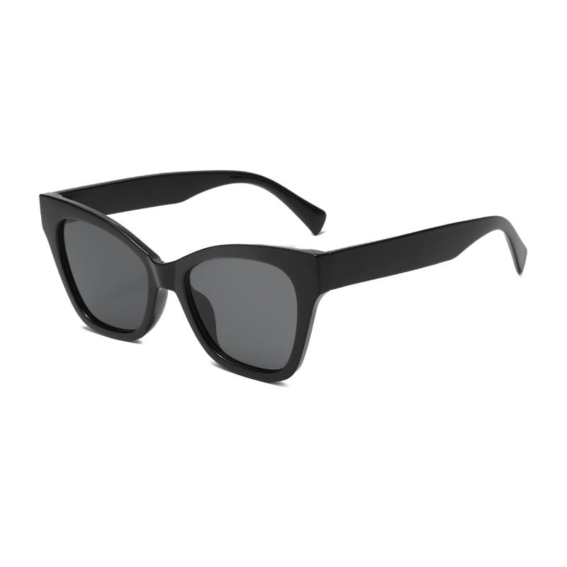 Gafas de sol de moda con forma de ojo de gato color negro con lentes gris oscuro y una montura elegante y brillante con protección UV.