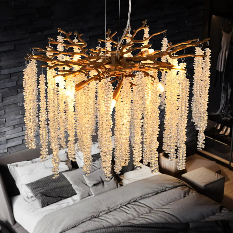 24 inch gold crystal waterfall pendant light featuring a golden branch chandelier adorned with cascading clear crystal beads.