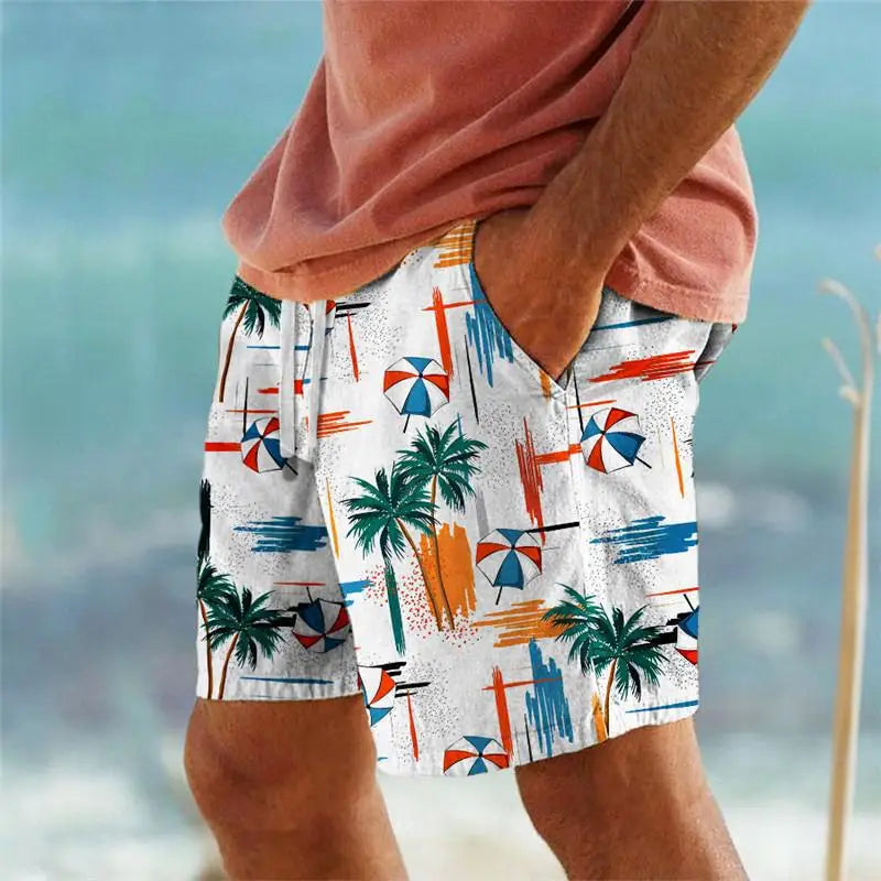 Men’s striped tropical print swim trunks in white featuring vibrant green palm trees red and blue umbrellas and abstract orange and blue brushstroke accents.
