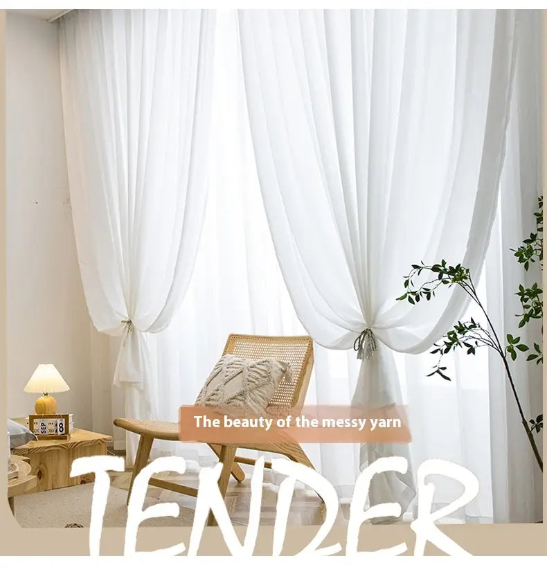 Sheer white textured sunscreen linen curtains with delicate flowing fabric and soft ties at the ends for home use.