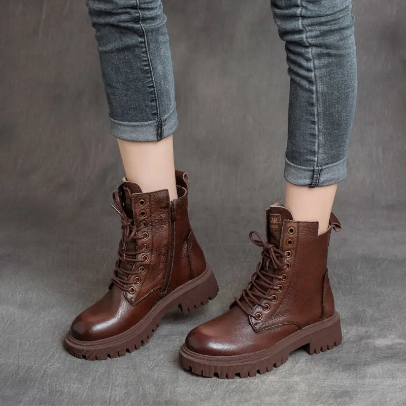 Martin boots women’s leather chunky lace up combat boots in brown with a sturdy chunky sole.