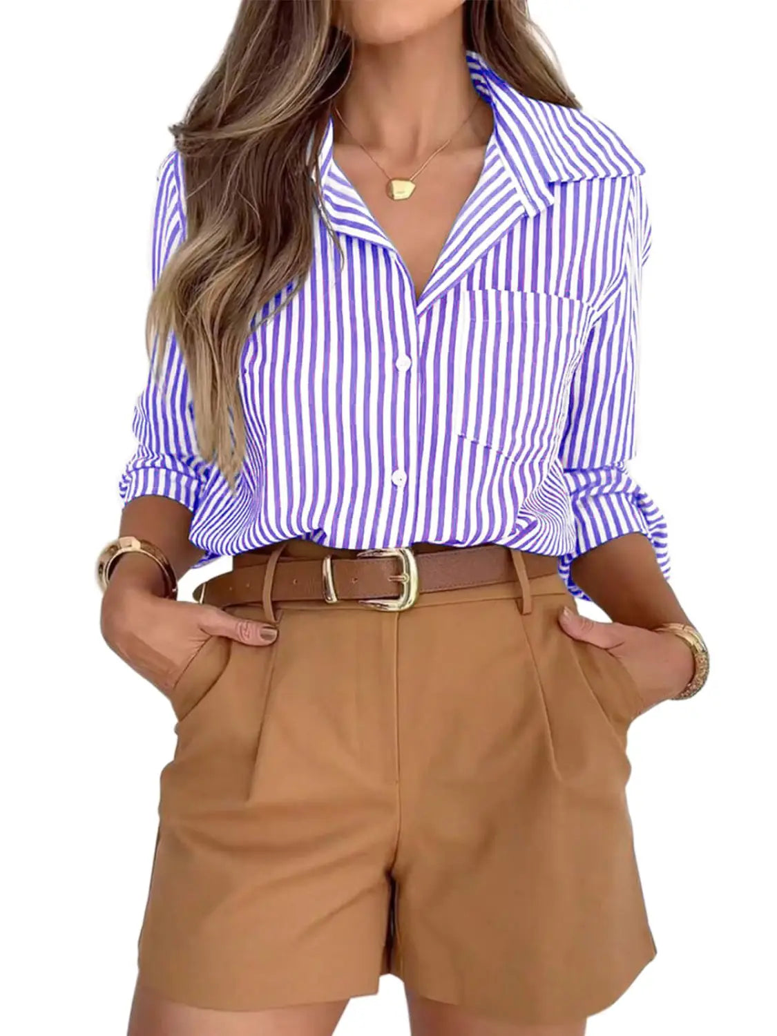 A woman wears a women’s striped long sleeve button up shirt dress featuring bold vertical stripes in vibrant purple and white made from crisp fabric.