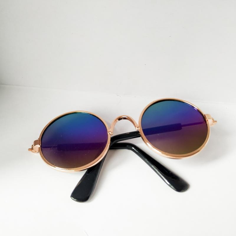 Rose gold metal round cat sunglasses with gradient blue to purple mirrored lenses and black temple arms.