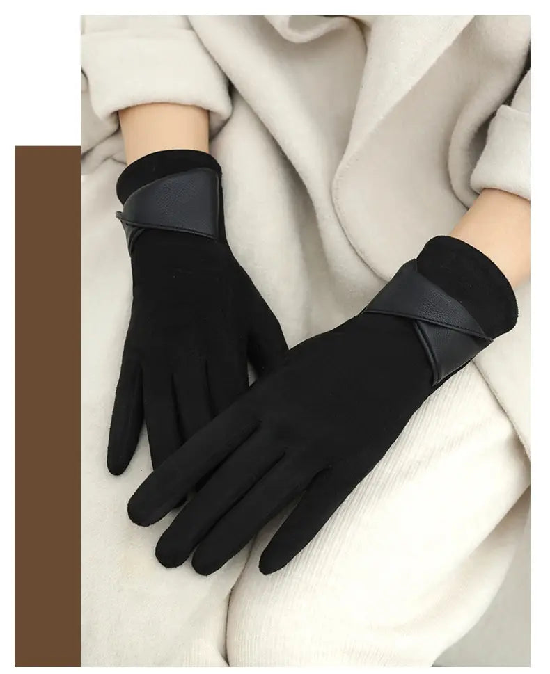 black touchscreen fleece lined bow gloves with a sleek stretchy fabric body and contrasting black leather wrist straps shown from the back side