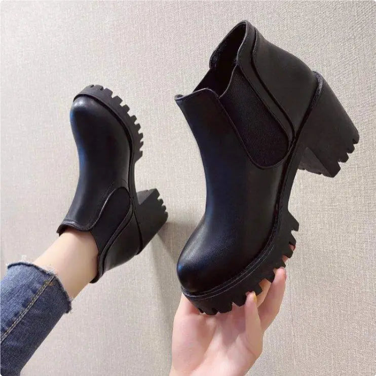 women’s black leather chunky heel ankle boots with elastic side panels and textured chunky soles