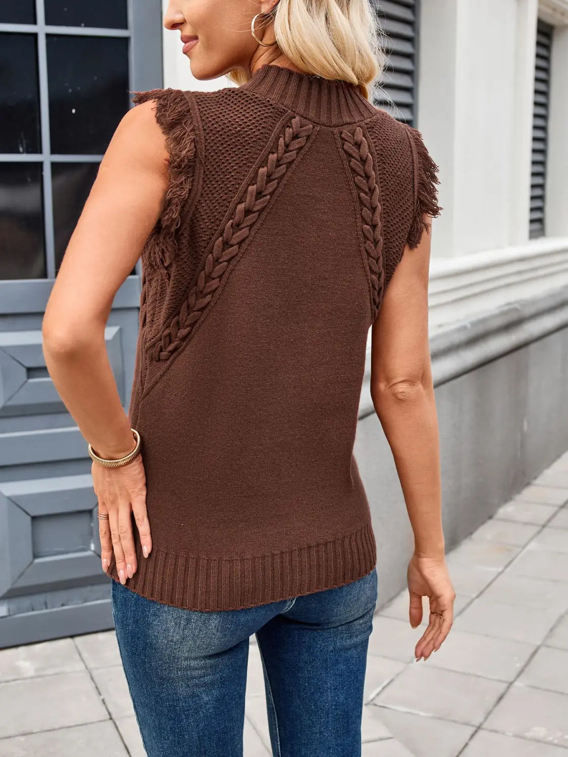 brown hand-woven sleeveless knit sweater vest with braided texture and frayed shoulder details