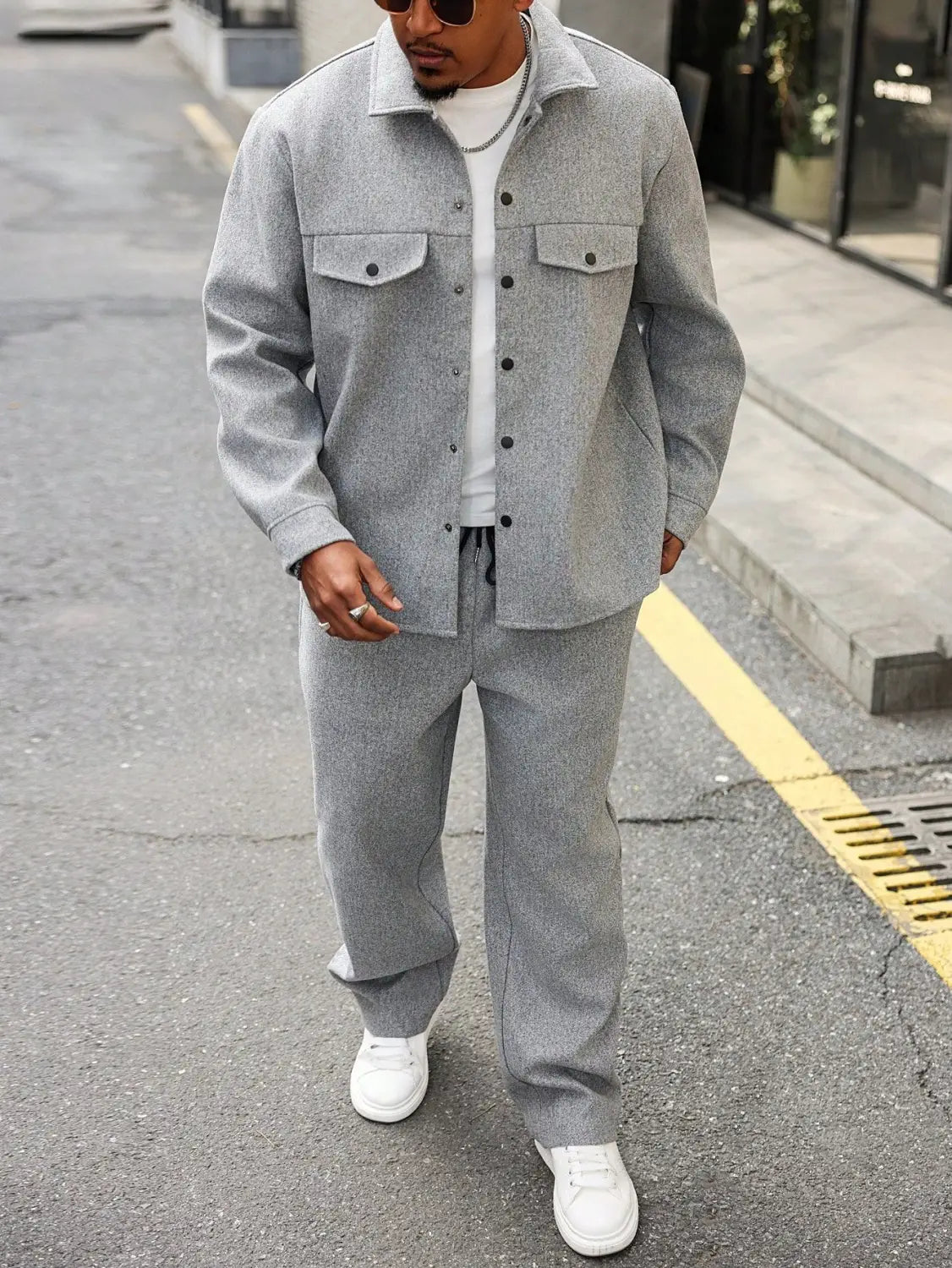 Mens cargo jacket and pants set featuring a gray woolen button-up jacket with two chest pockets and black buttons