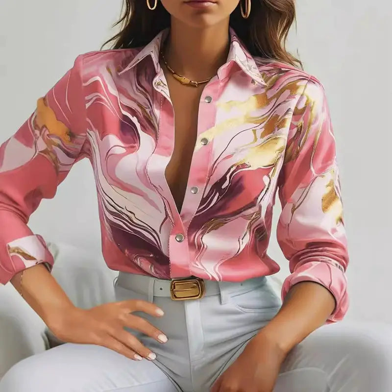 women’s marble print satin long sleeve button blouse in pink white and gold with rolled sleeves.