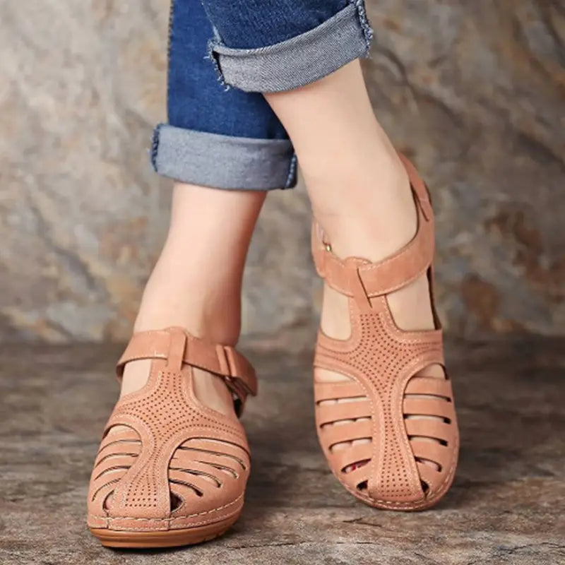 Tan leather retro wedge sandals for women plus size featuring a t-strap design and perforated detailing.