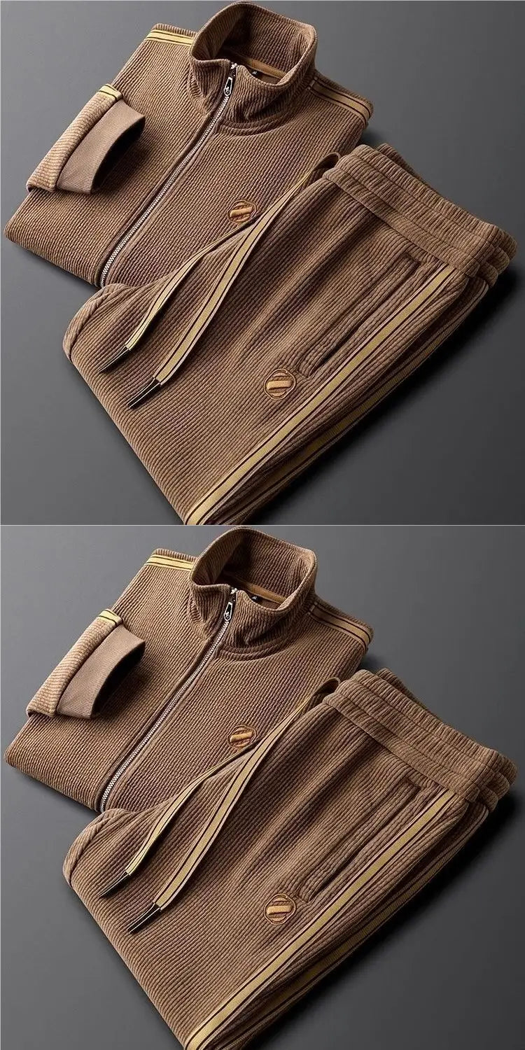 Men corduroy striped tracksuit set in brown ribbed knit featuring matching pants and a high collar zip-up top with subtle gold trim along the zipper line and side seams.