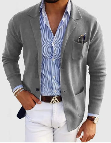 Men printed double button suit jacket in gray textured fabric with a subtle sheen featuring buttoned cuffs and a pocket holding sunglasses.