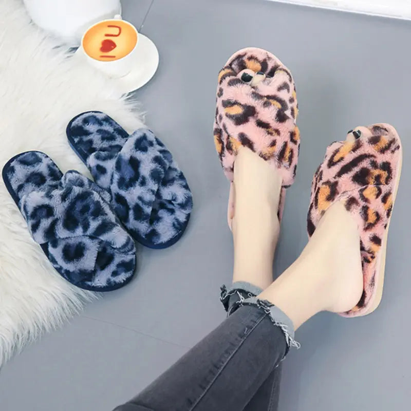 Leopard fuzzy cross strap plush house slippers in pink and brown leopard print with a soft fuzzy texture.