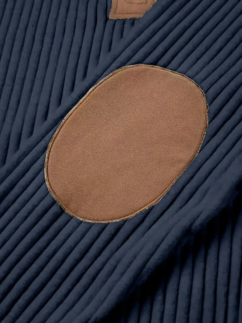 Men’s ribbed patchwork half zip knit sweater in navy blue corduroy with brown suede elbow patch.