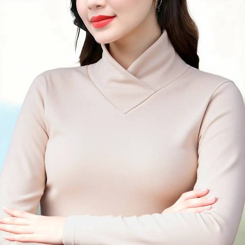 beige dralon turtleneck thermal base layer top with smooth form-fitting fabric and long sleeves