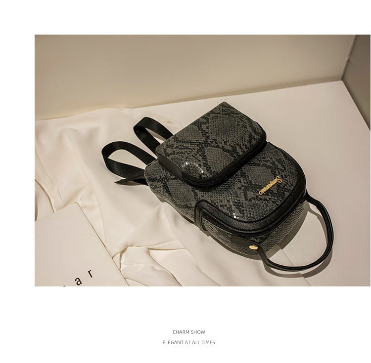 A sleek black and gray snake-print mini backpack with glossy accents in Korean style.