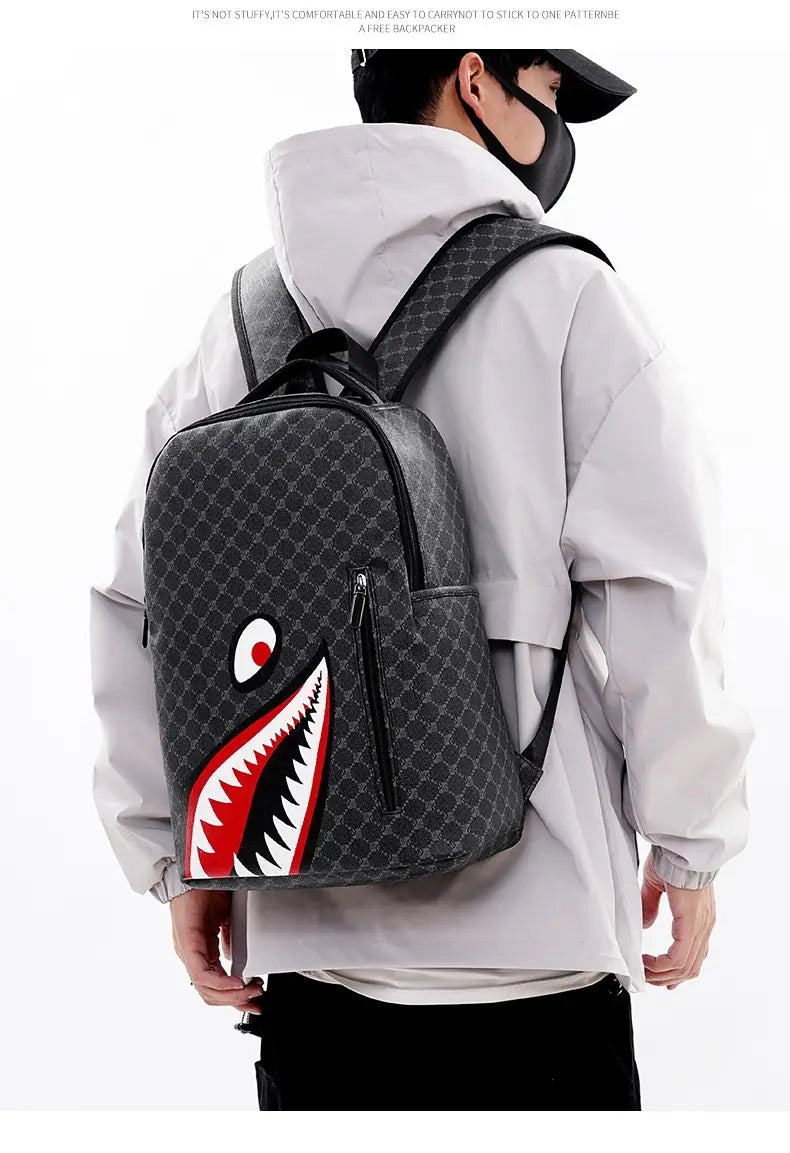 black backpack with bold red and white shark mouth design on repeating patterned fabric large capacity geometric business pu bag.