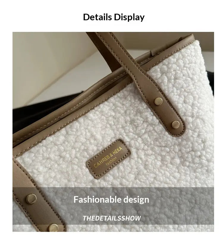 Brown faux fur tote bag with white fluffy texture featuring tan leather handles and trim with a small rectangular brand tag.