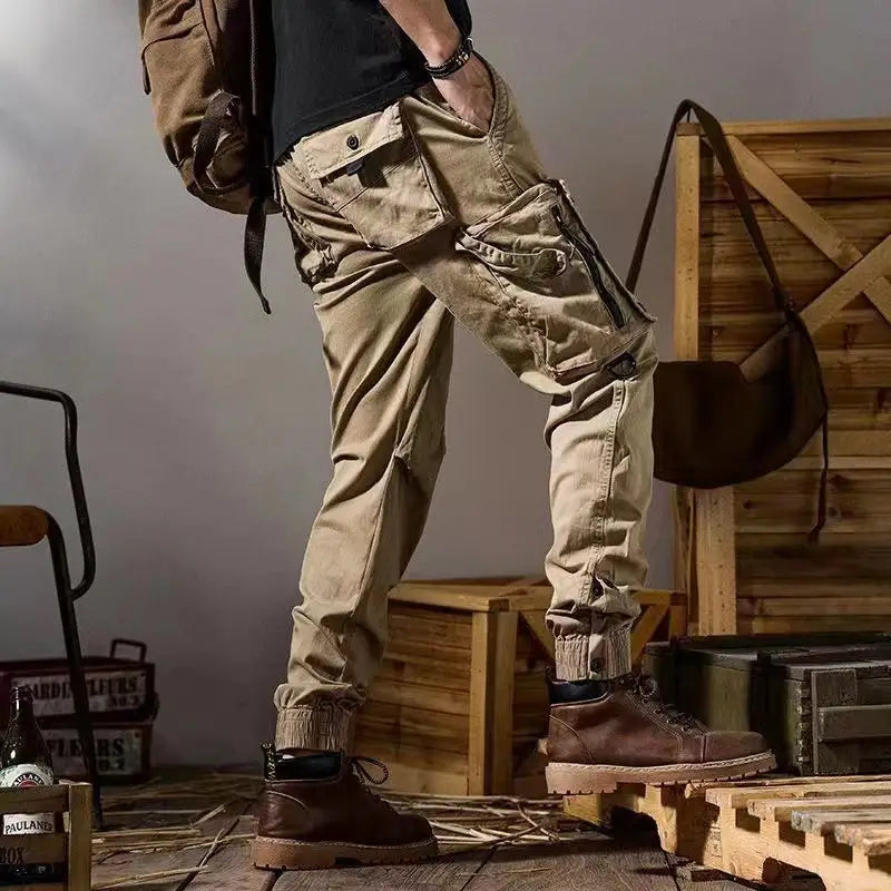Men tactical cargo pants outdoor casual utility trousers in beige with multiple pockets and a relaxed fit for versatile use.