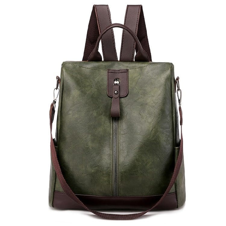 Rucksack mit Diebstahlschutz aus olivgrünem Kunstleder, mit braunen Trägern und vorderem Reißverschluss, entworfen für Reisen in der Stadt.