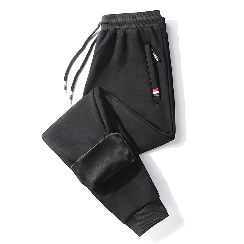 black fleece lined men joggers with a drawstring waistband and side pockets featuring a small red white and blue flag patch made of cotton for casual wear