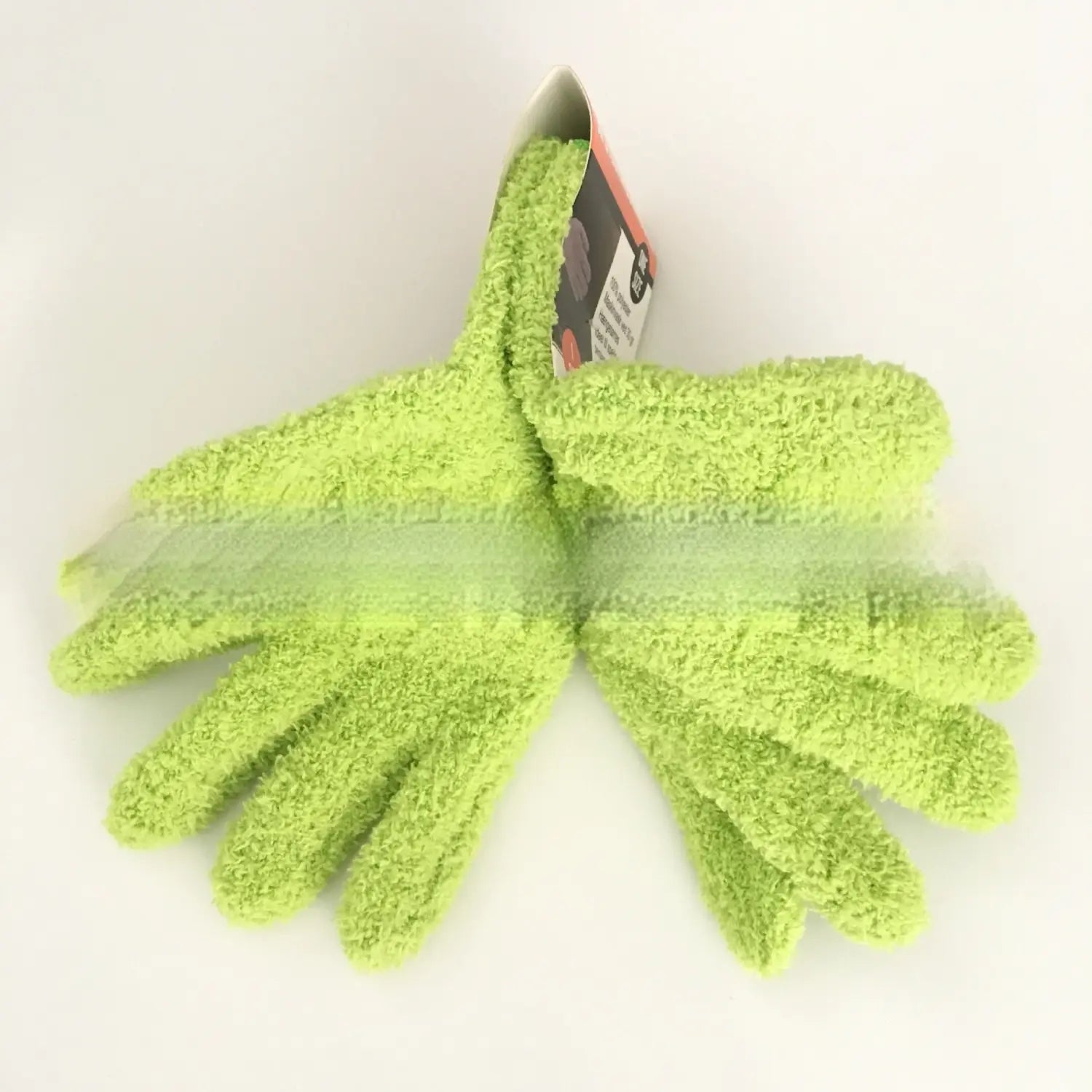 Plush coral fleece bath dust gloves in bright lime green with a soft fuzzy material and plush texture.