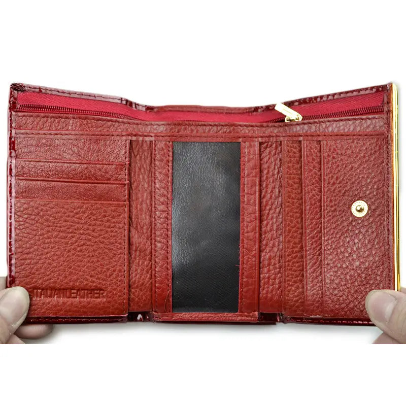 Red textured crocodile pattern leather trifold wallet with gold-tone zipper and snap closure.
