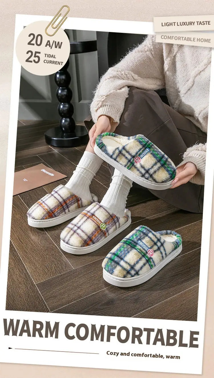 Unisex plaid fleece lined non slip indoor slippers with a soft fluffy interior and white rubber soles.