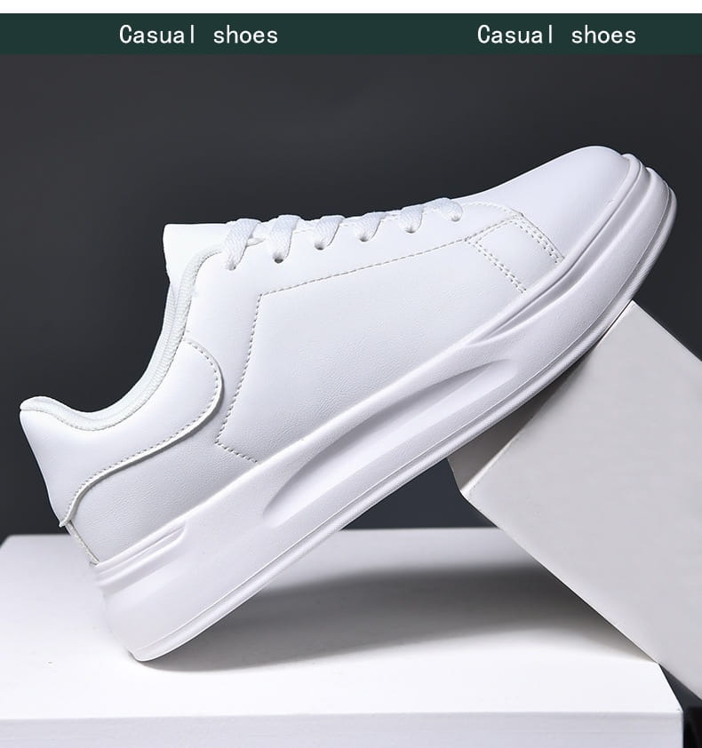 Baskets de loisirs épaisses et imperméables en cuir blanc, avec une semelle épaisse et massive ainsi que des finitions de couture soignées.